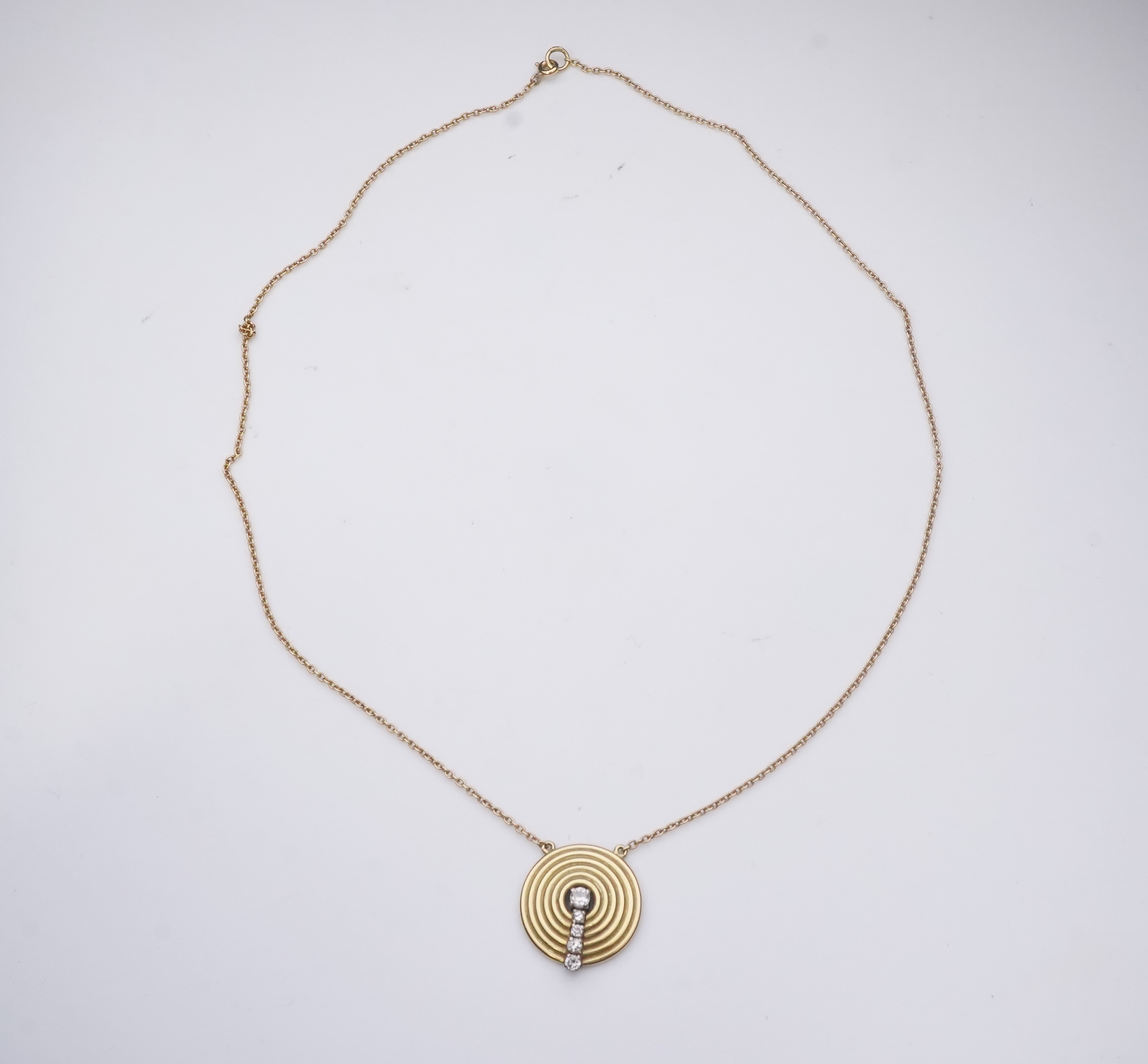 An 18ct gold and diamond pendant, circa 1978